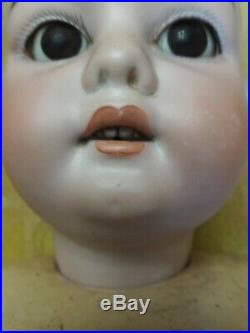 Antique German bisque head doll marked L H K, wood and composite body Rare 24