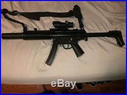 Elite force H&K Mp5 with mock silencer / comes with a battery / comes w 2k bbs