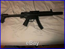 Elite force H&K Mp5 with mock silencer / comes with a battery / comes w 2k bbs